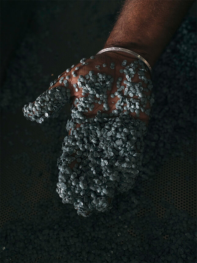 Plastic particles on a hand