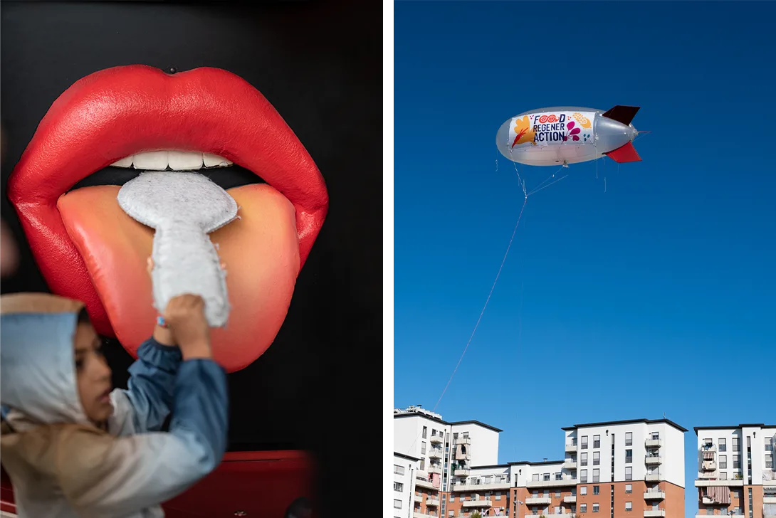 A woman with a sculpture of a mouth and a zeppelin with the inscription "Foodregeneraction" (Photo)