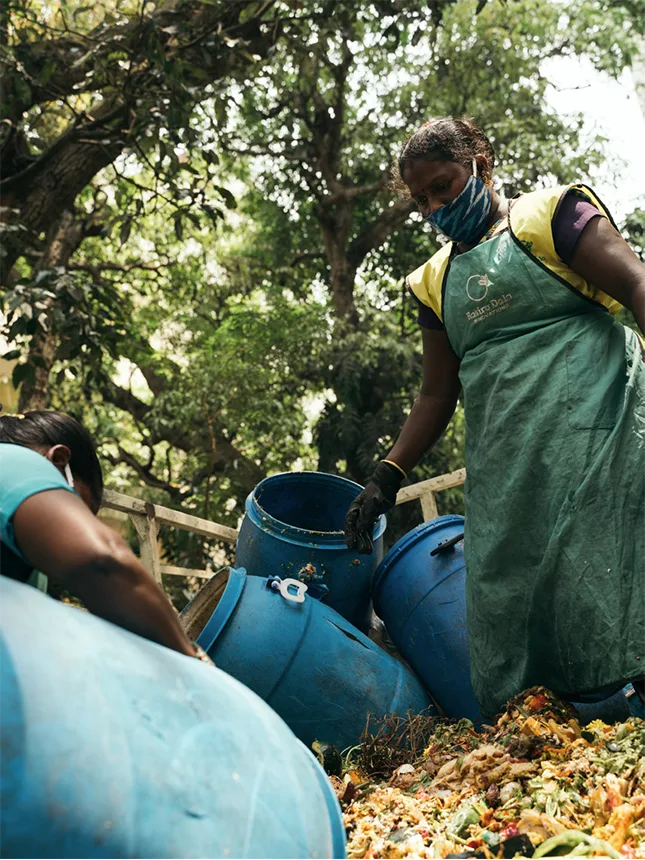 Women process biological waste (Photo)