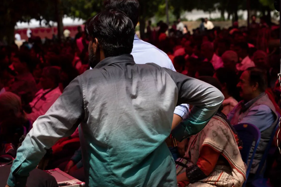 A man takes part in a meeting (Photo)