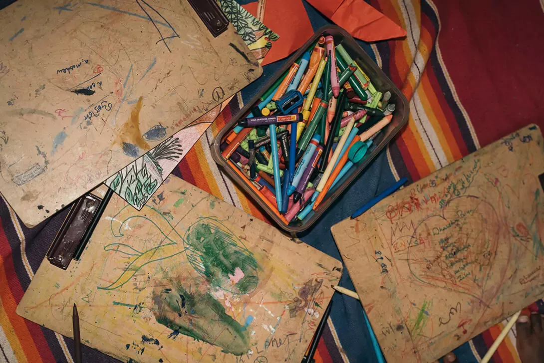 Wax crayons and children's drawings (Photo)