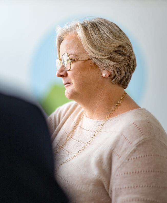 Portrait of Katja M&ouml;ller, shown in side profile during a talk.